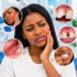 Dental warning signs including a chipped tooth and painful gums during a dental examination