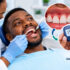 Diabetes and gum disease showing a dentist examining a patient's gums during a dental check-up